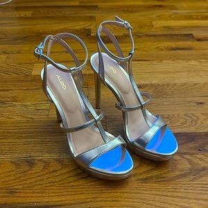 Also silver 5.5” platform heels size 9
